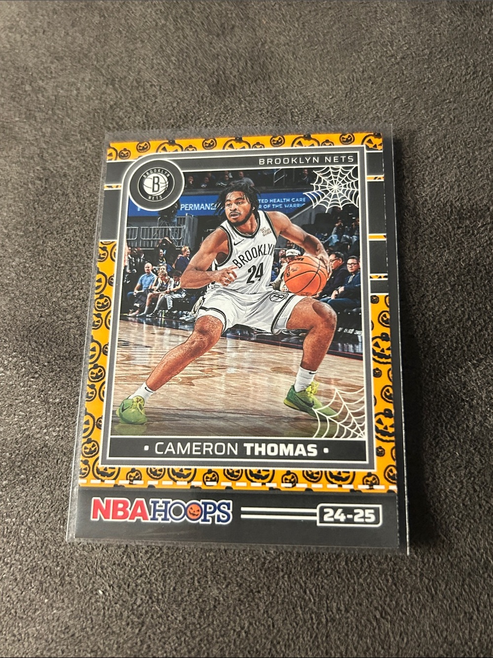 Panini NBA Hoops Cameron Thomas Orange and Black Basketball Card